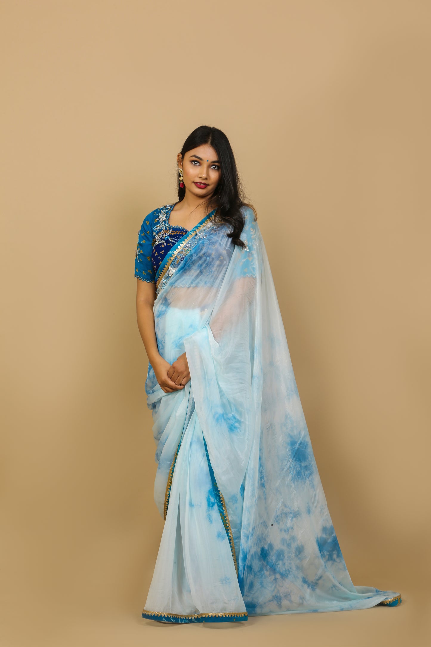 Blue tie and dye custom size saree for wedding functions.