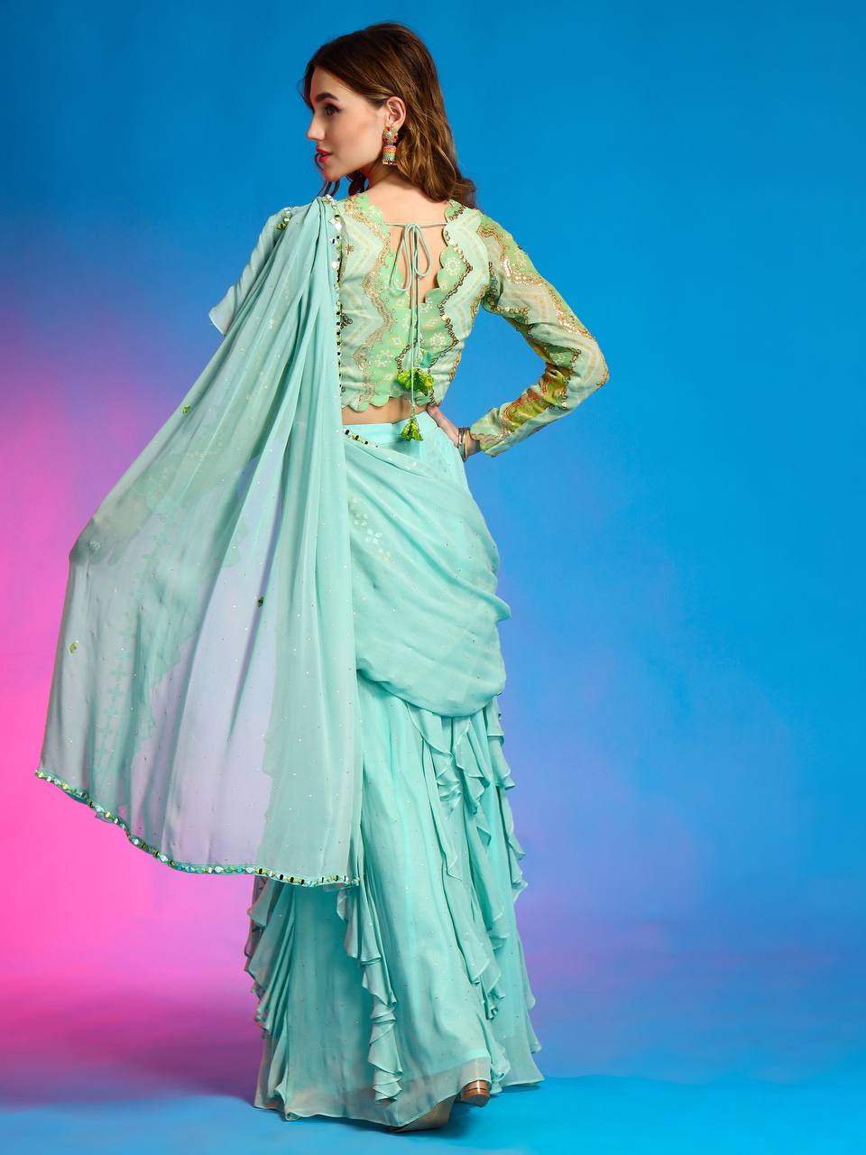 Custom size pale blue designer saree for wedding functions.