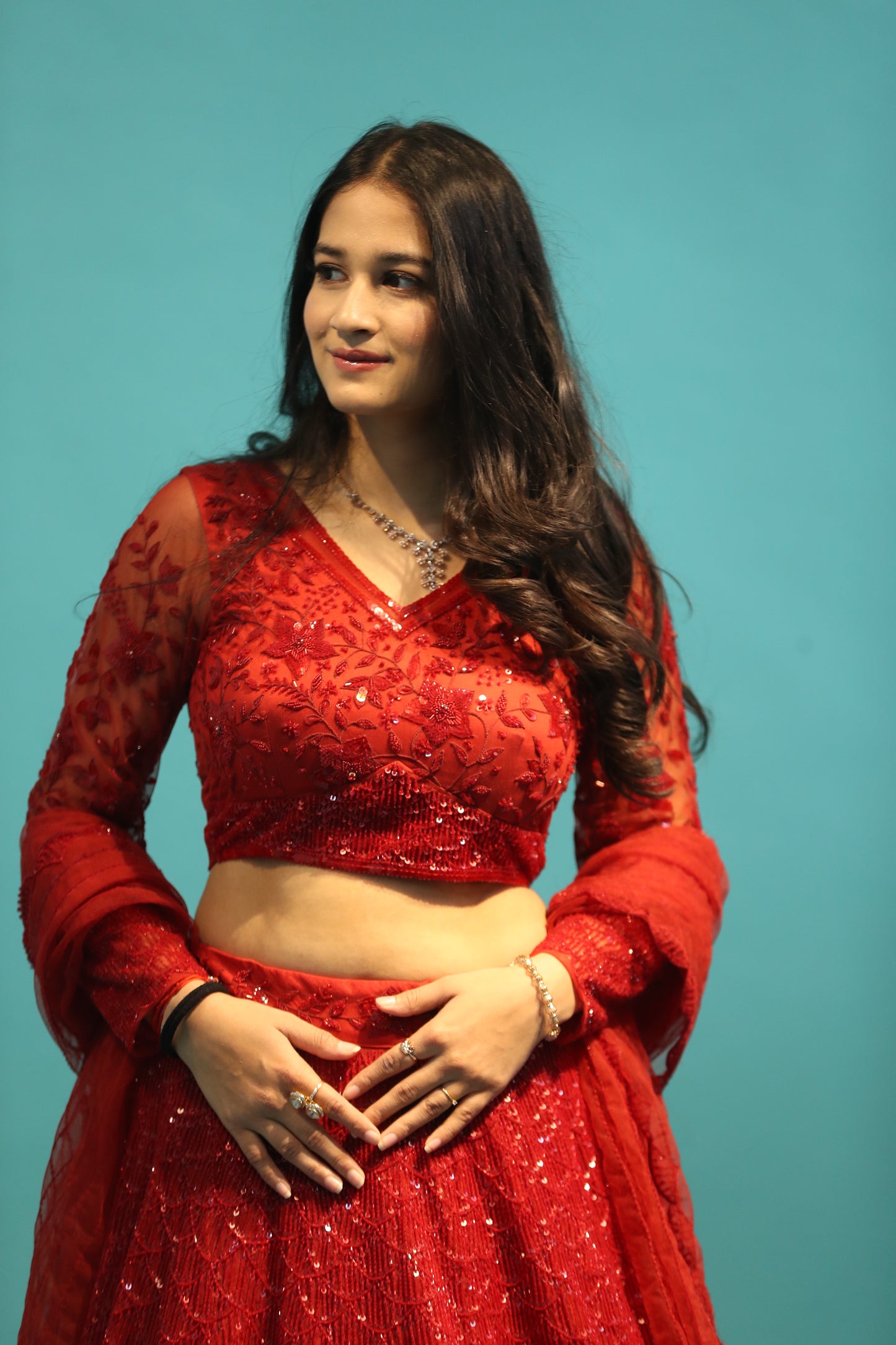 red custom size lehenga set with floral embellished blouse.