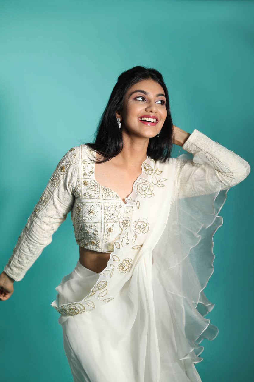 white drape saree with lucknowi look blouse.