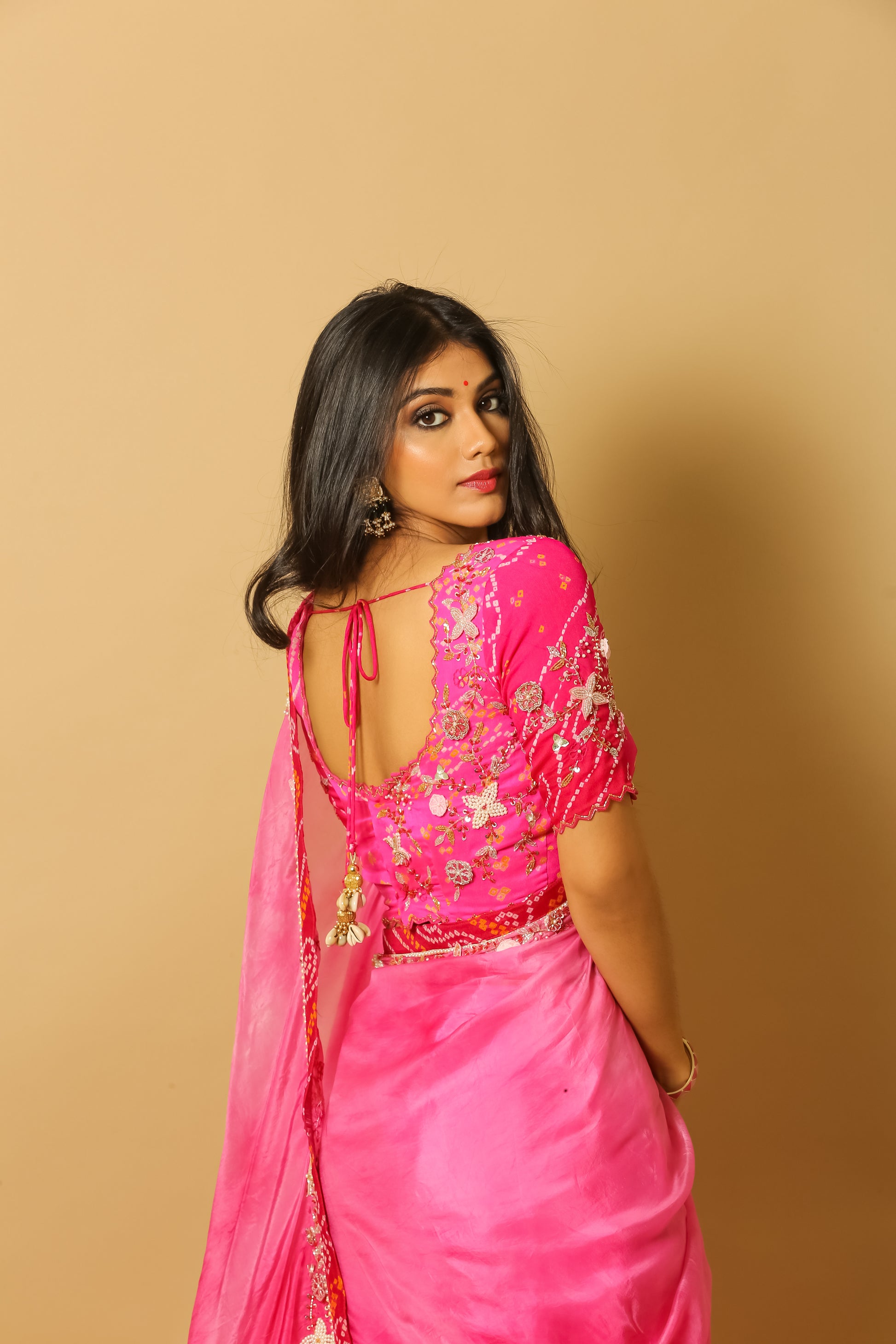 All eyes on you rani pink saree made from silk fabric.