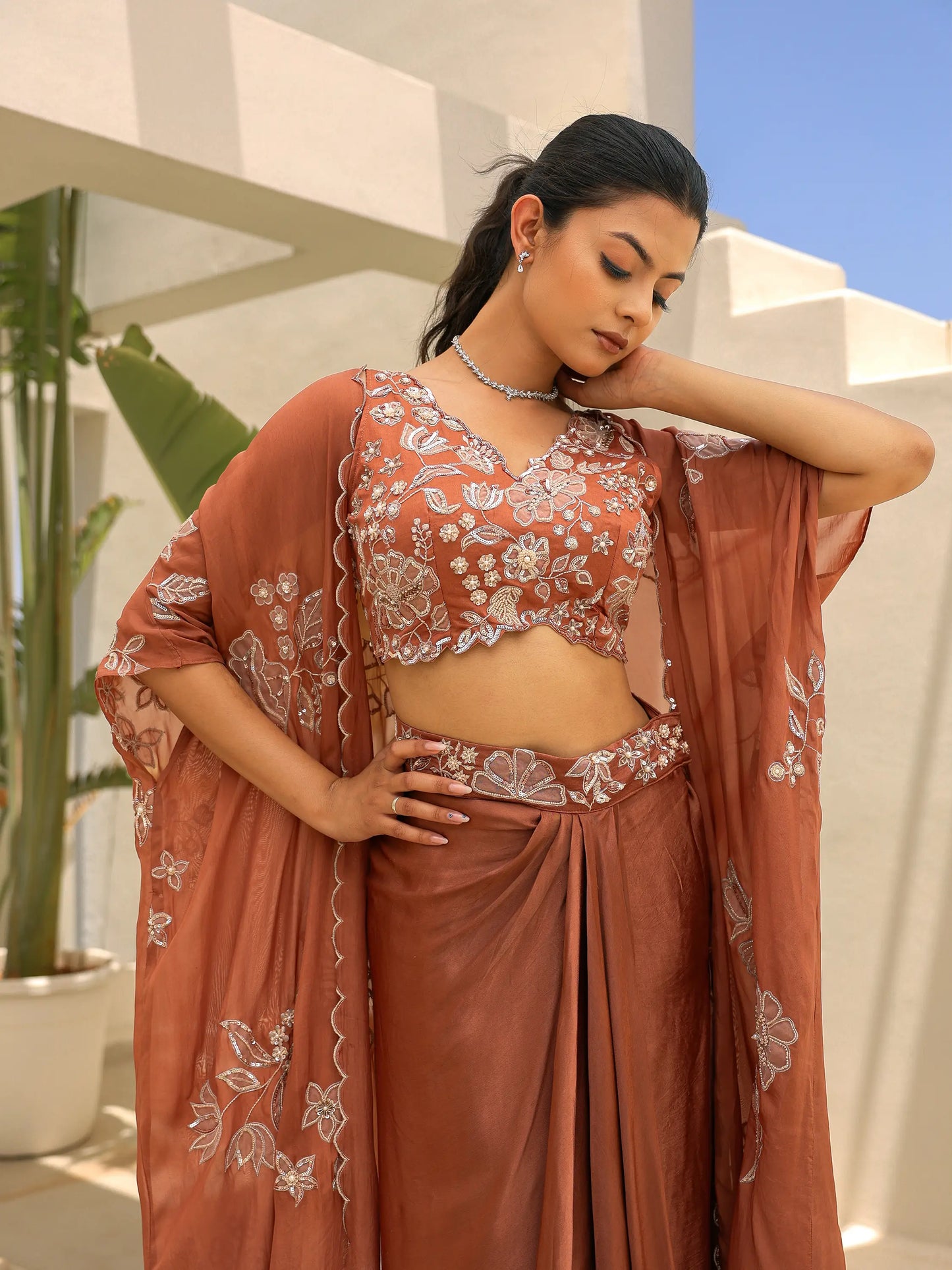 cutwork appliqué blouse with cutdana and sequins embroidery detail on mocha gazi silk ensemble