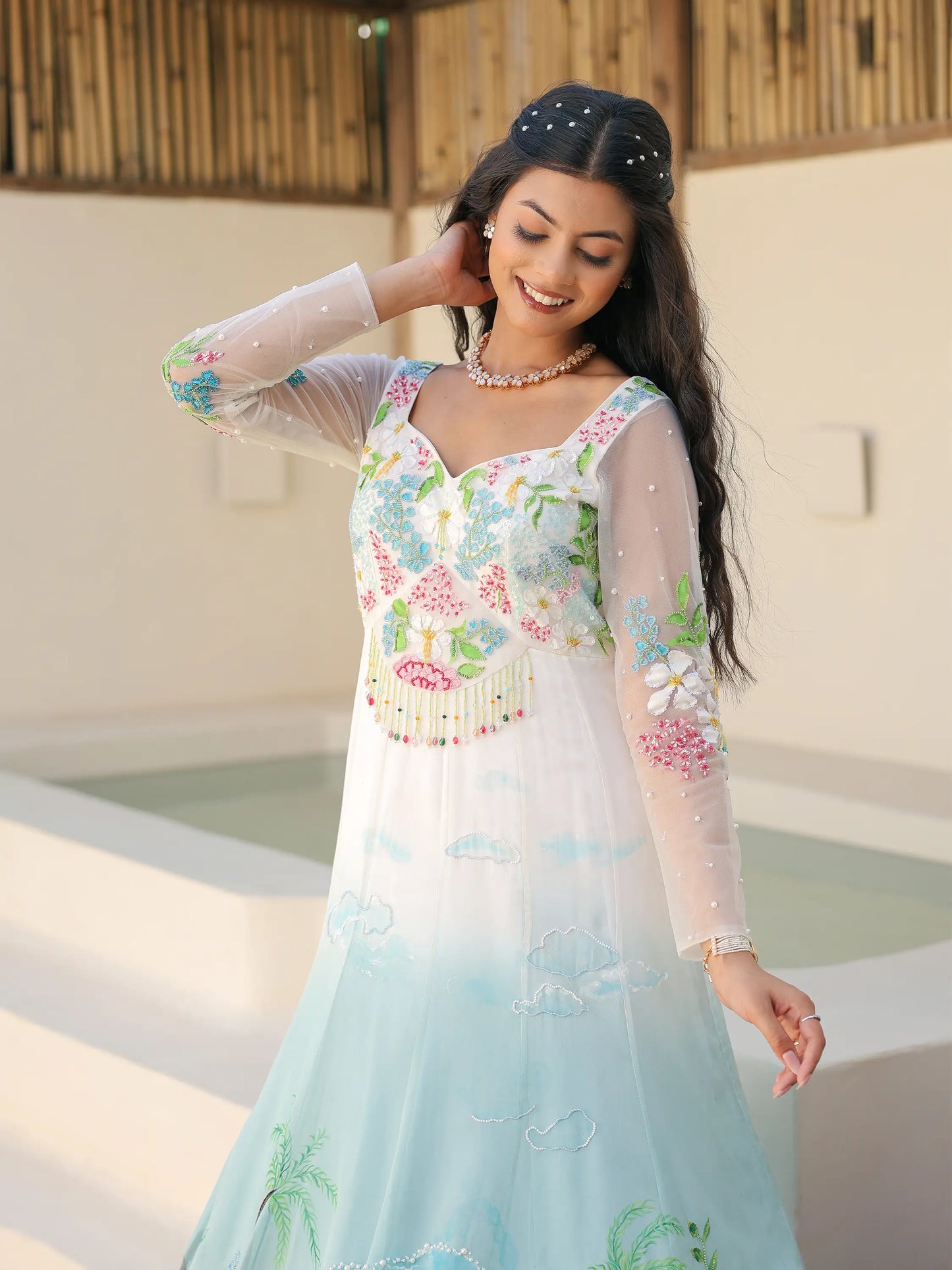 Coastal ombre viscose organza gown with hand painted tropical motifs and pearl beaded detailing front view