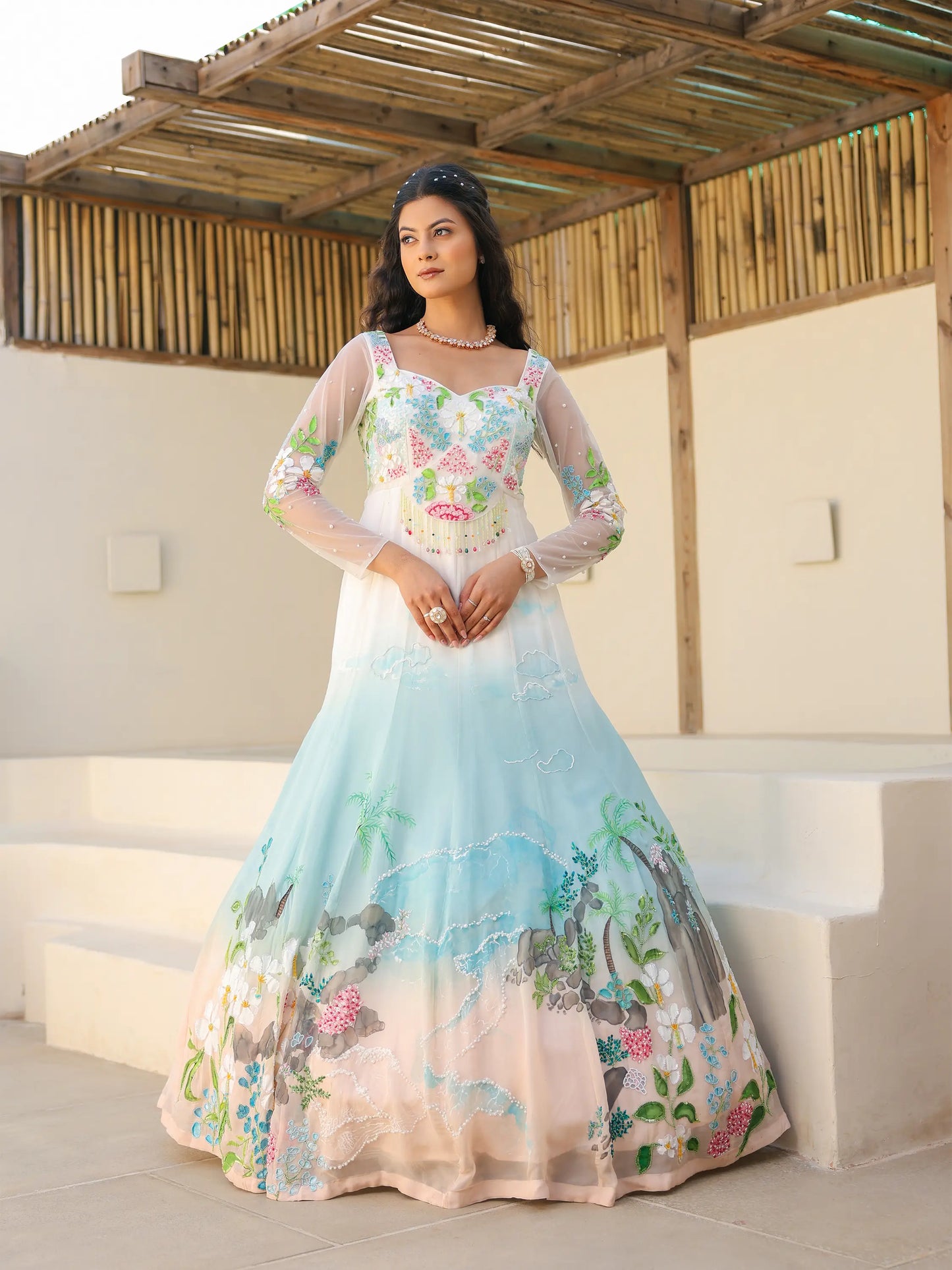 Full length coastal ombre viscose organza gown featuring tropical shoreline motifs and embroidered detailing