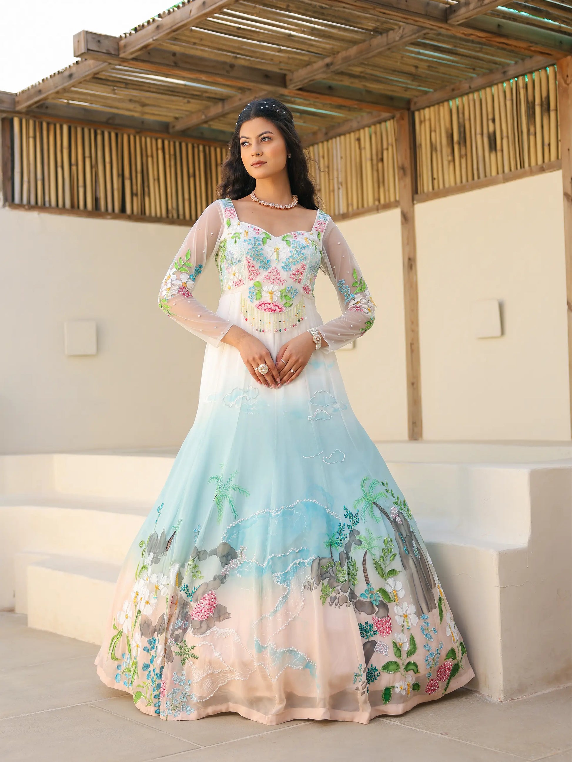 Full length coastal ombre viscose organza gown featuring tropical shoreline motifs and embroidered detailing