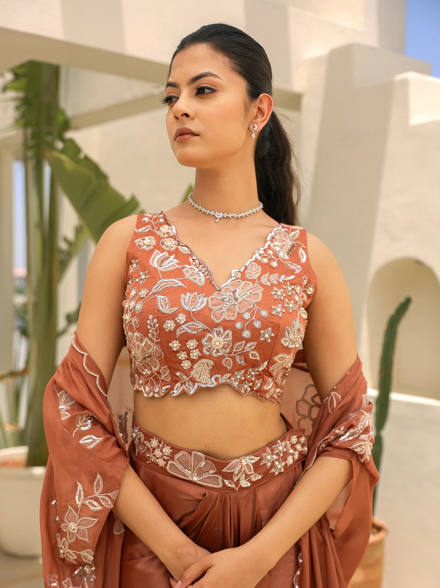 cutwork appliqué blouse with cutdana and sequins embroidery detail on mocha gazi silk ensemble