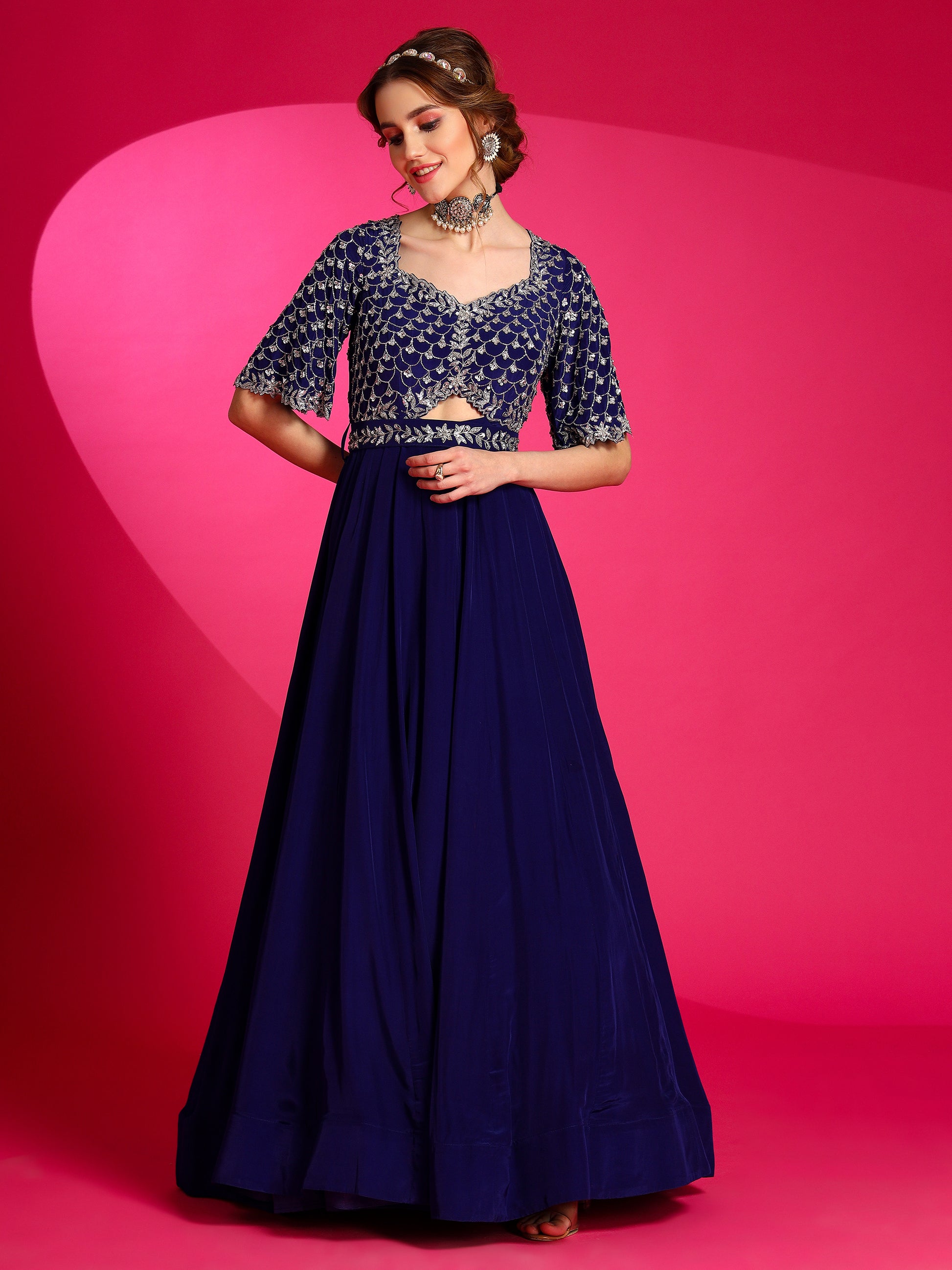 Ethnic designer blue gown perfect for cocktail parties.