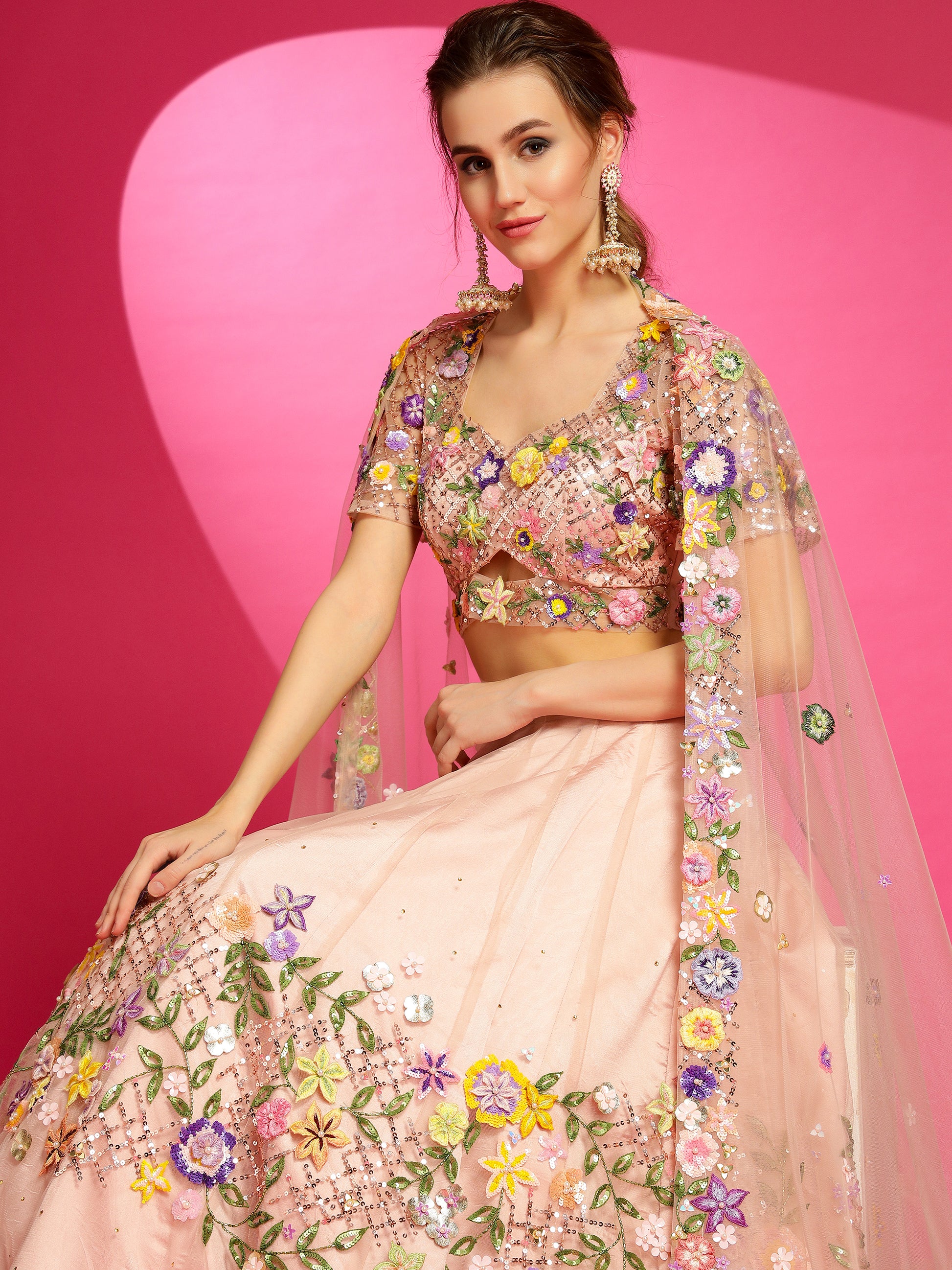 embroidered designer lehenga for a vibrant carnival.