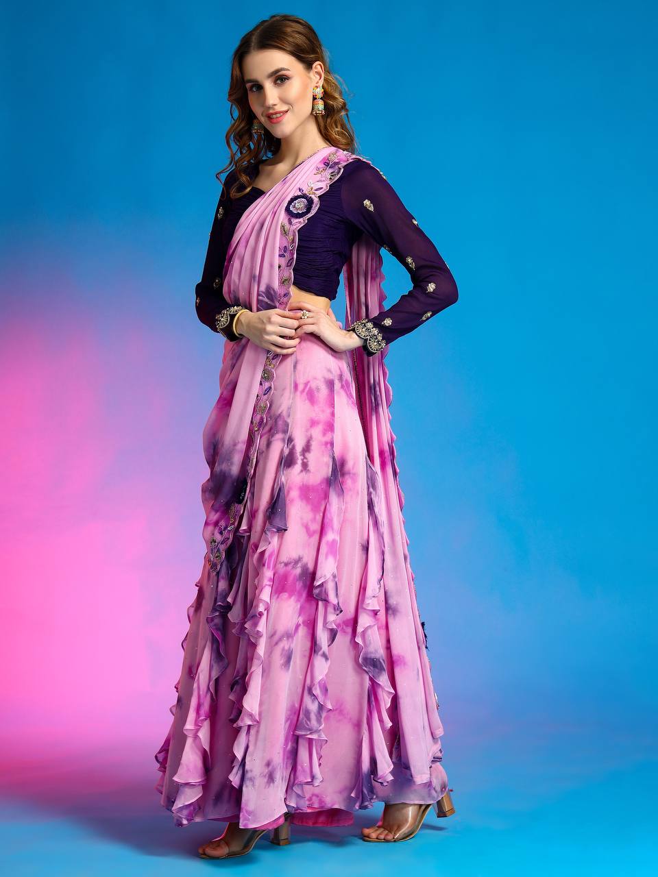 La bonita drape saree in lilac and blue with ruffle kalis, zari & sequin work. by harry wed kelly