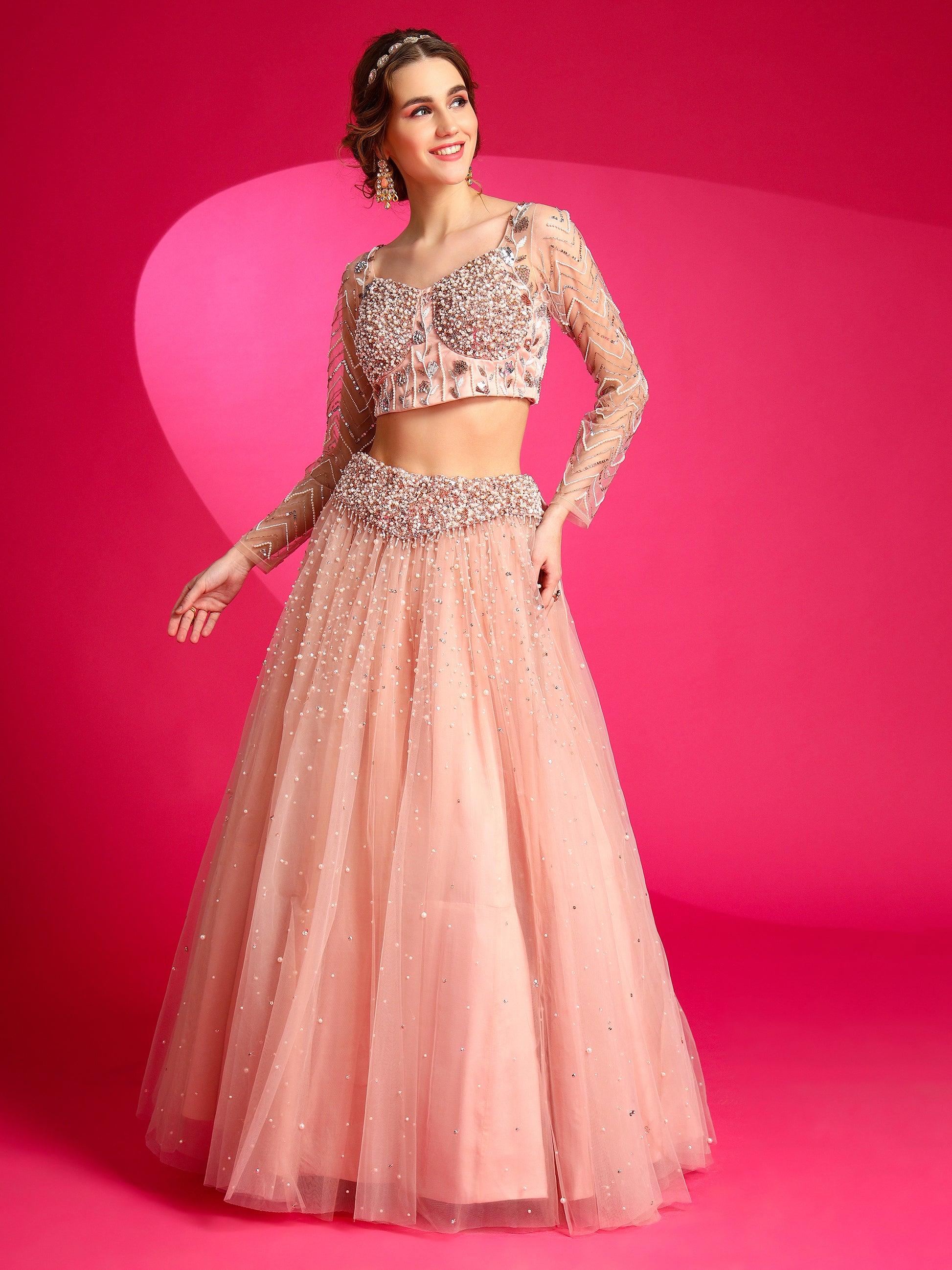 Misty rose lehenga set for festive occasions.