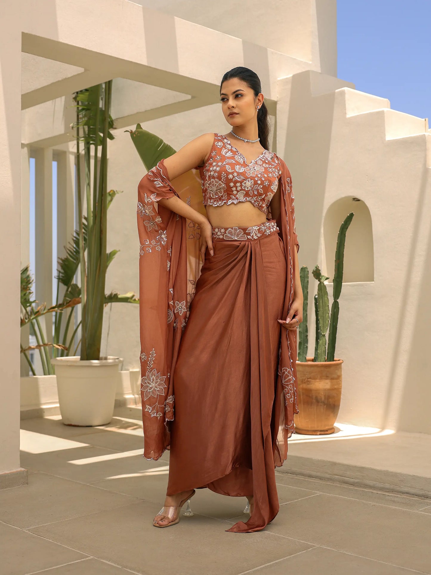 artisan embroidered mocha blouse with floral appliqué paired with gazi silk draped skirt set portrait
