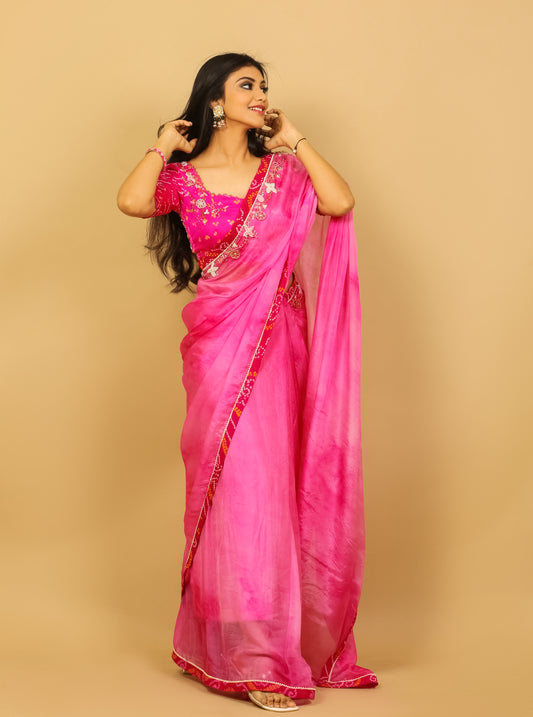 Rani pink silk designer saree for evening functions.