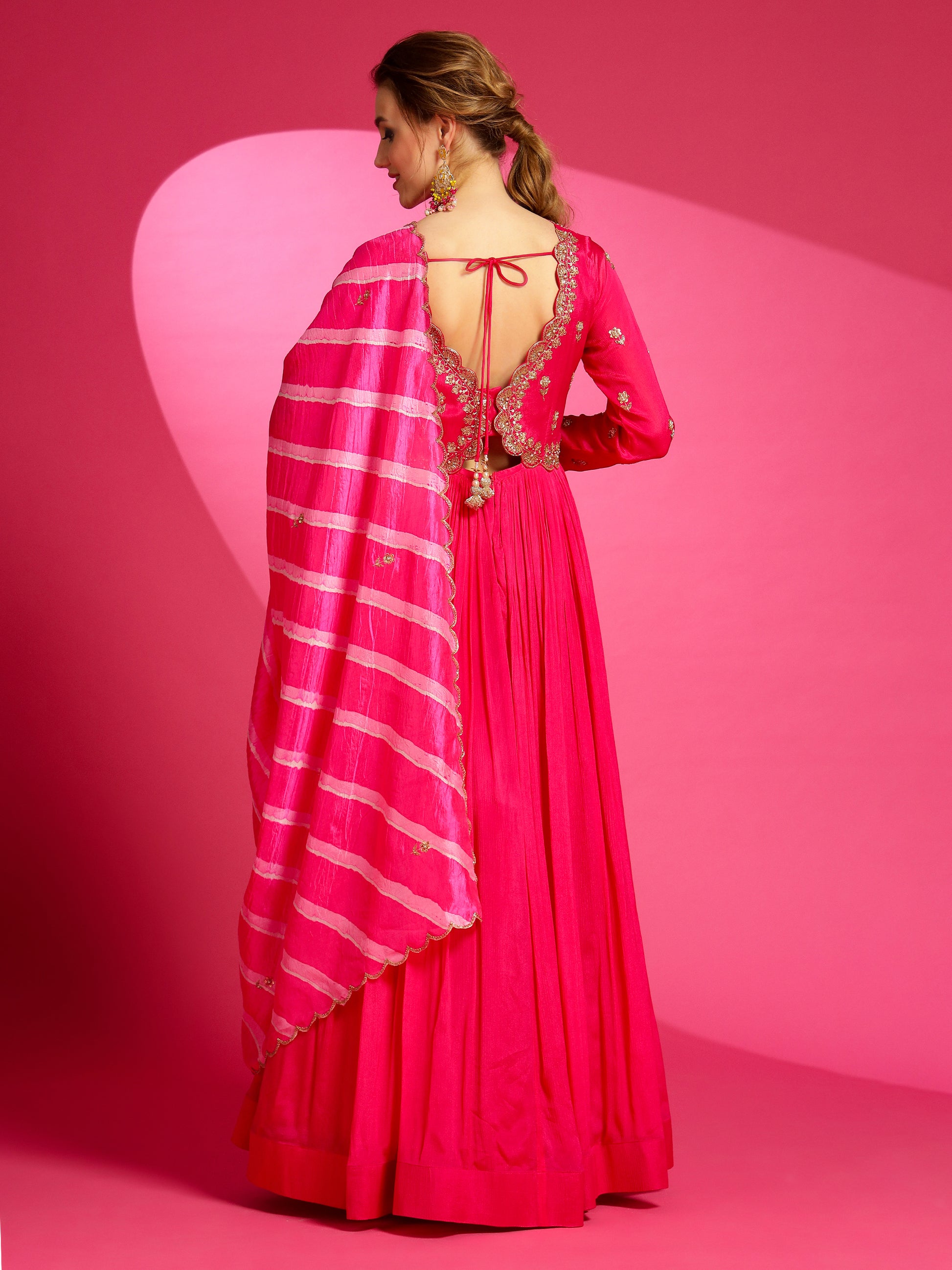 premium handmade rani pink gown for diwali. 