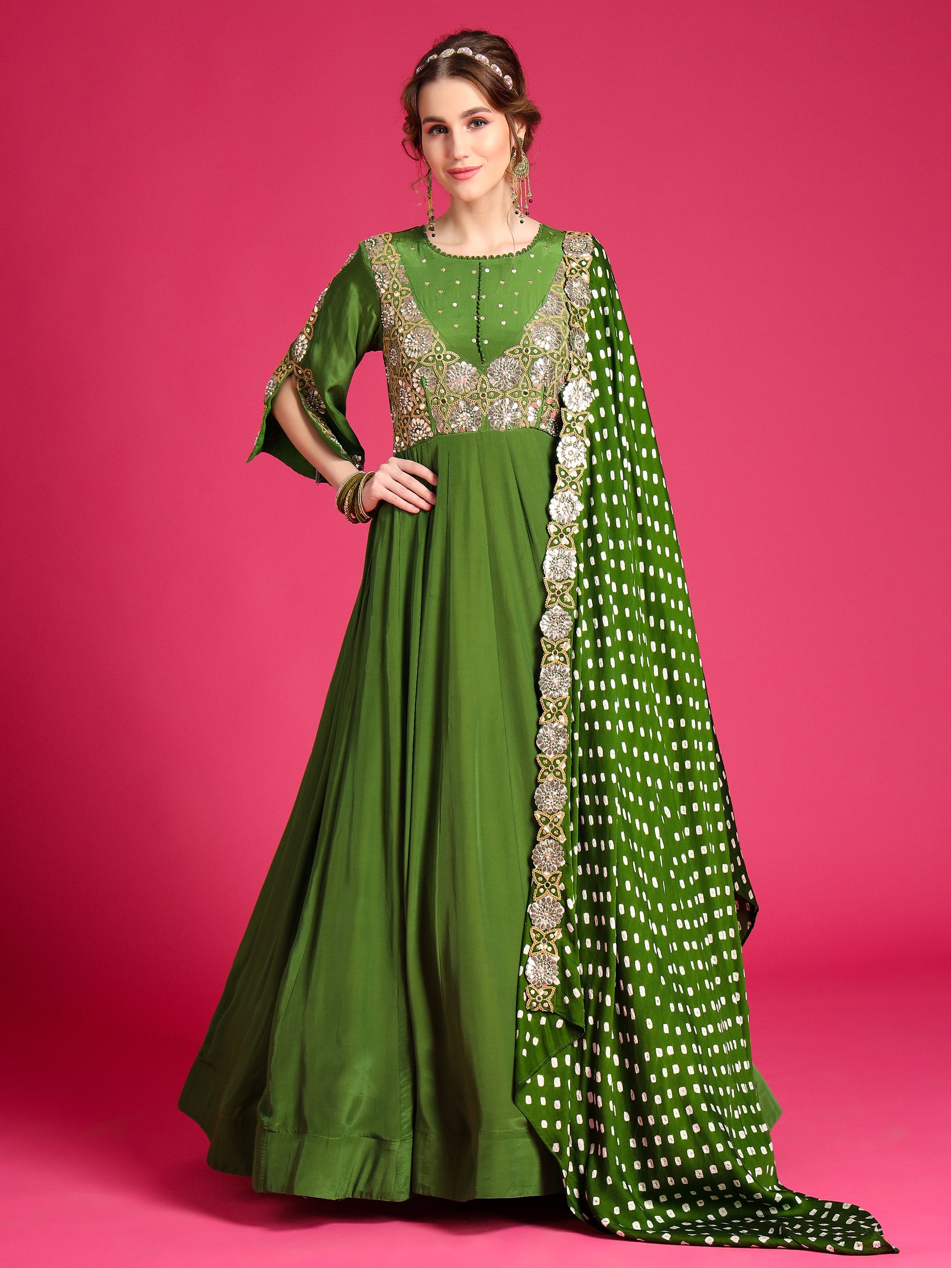 Olive green designer gown a perfect choice for raksha bandhan.