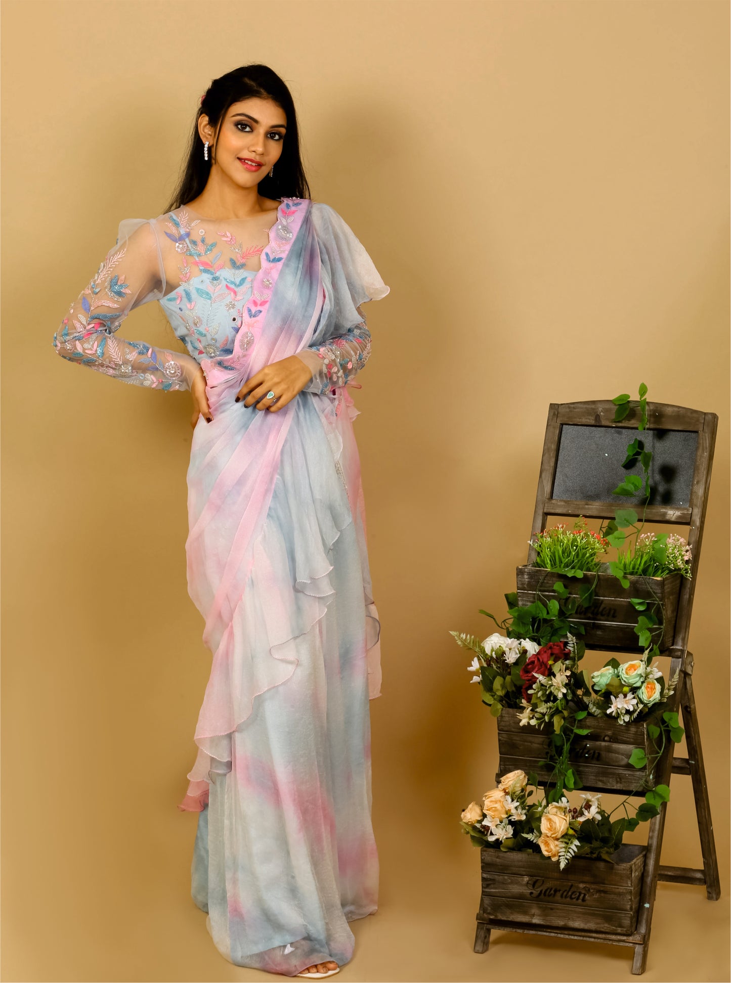 ruffle saree with net blouse ideal choice for weddings & engagements.