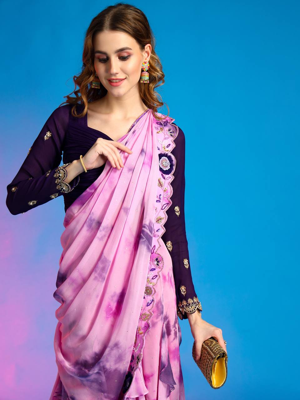 Lilac and blue drape saree: ruffle kalis cascading with grace for unforgettable celebrations.