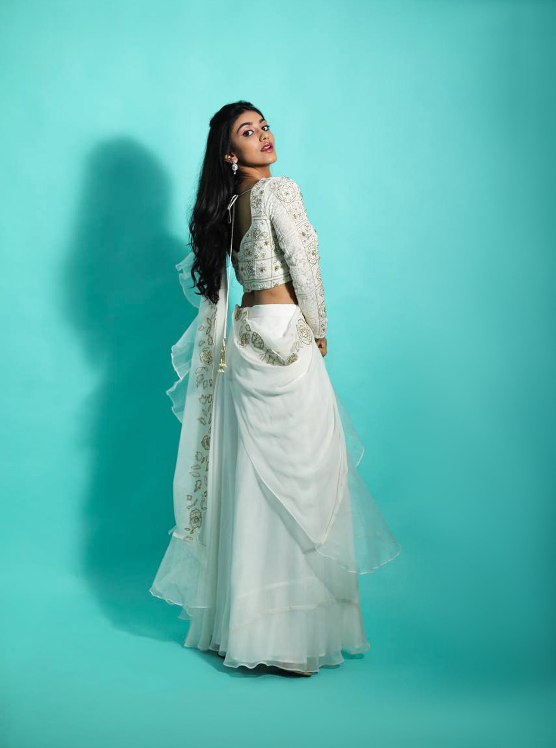 white wedding saree with cutwork design. harry wed kelly